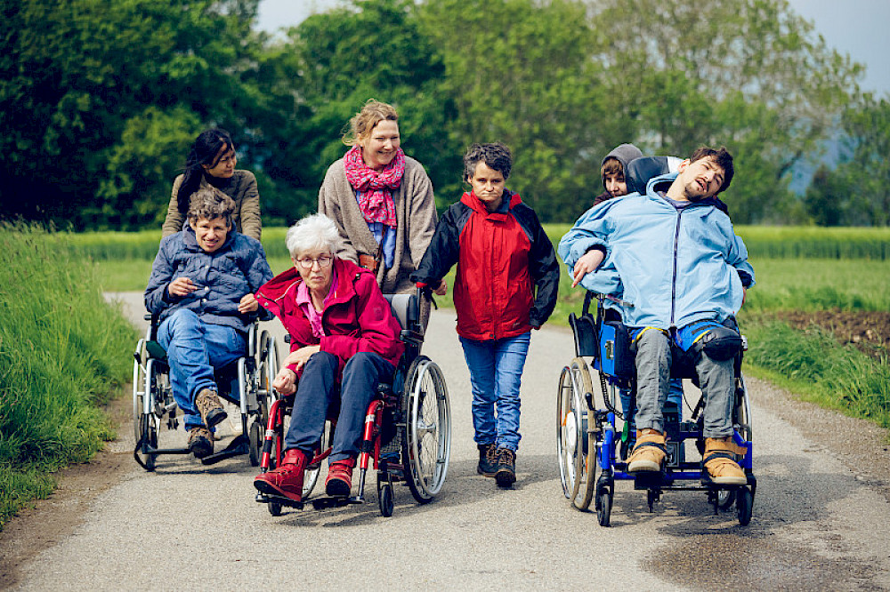 Image shows people walking.